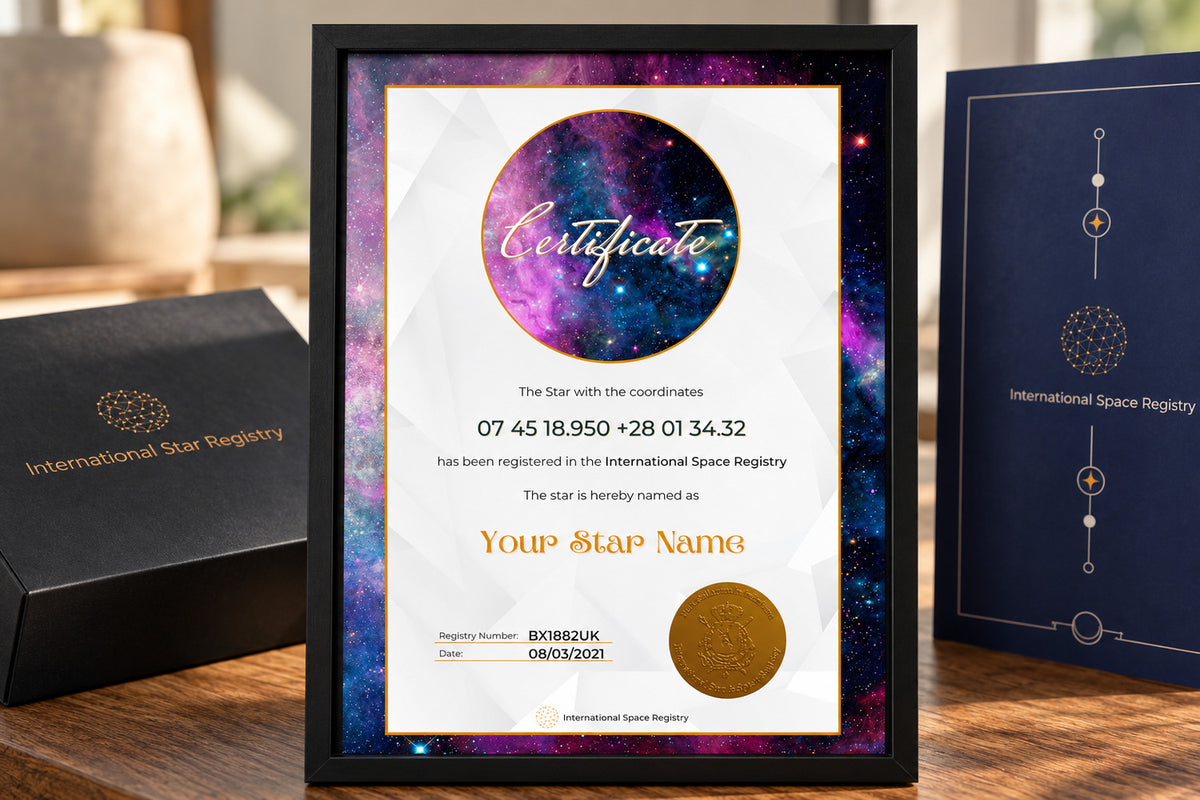 Front of a sample Star-Naming certificate beside the branded presentation box and folder
