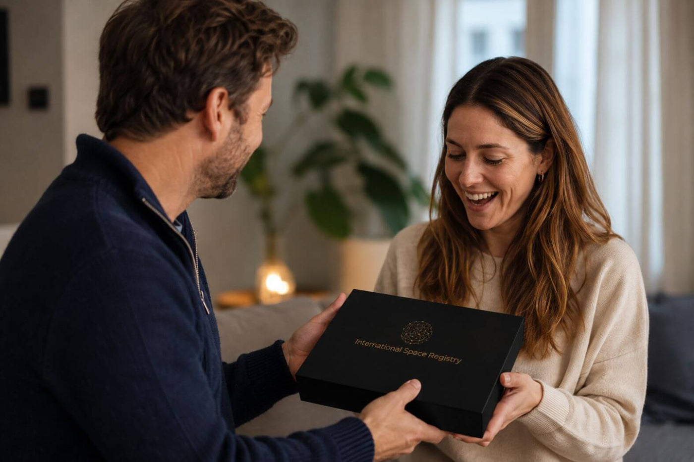 A man presents his wife with a Name a Star gift